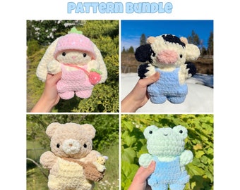 May include: Four crochet amigurumi animal patterns: a bunny wearing a pink dress and a strawberry hat, a cow wearing a blue dress, a bear wearing a beige dress, and a frog wearing a blue dress. Each animal is holding a small accessory.