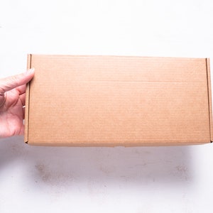 Veel van 9 stuks 10 x 4 x 1 inch bruine kraft kartonnen verzenddoos met deksel, gevouwen doos, geschenkverpakking,