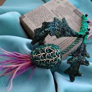 volume brooch thistle