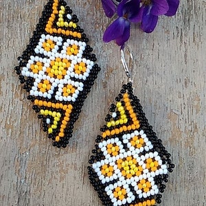 Beaded earrings with ornament