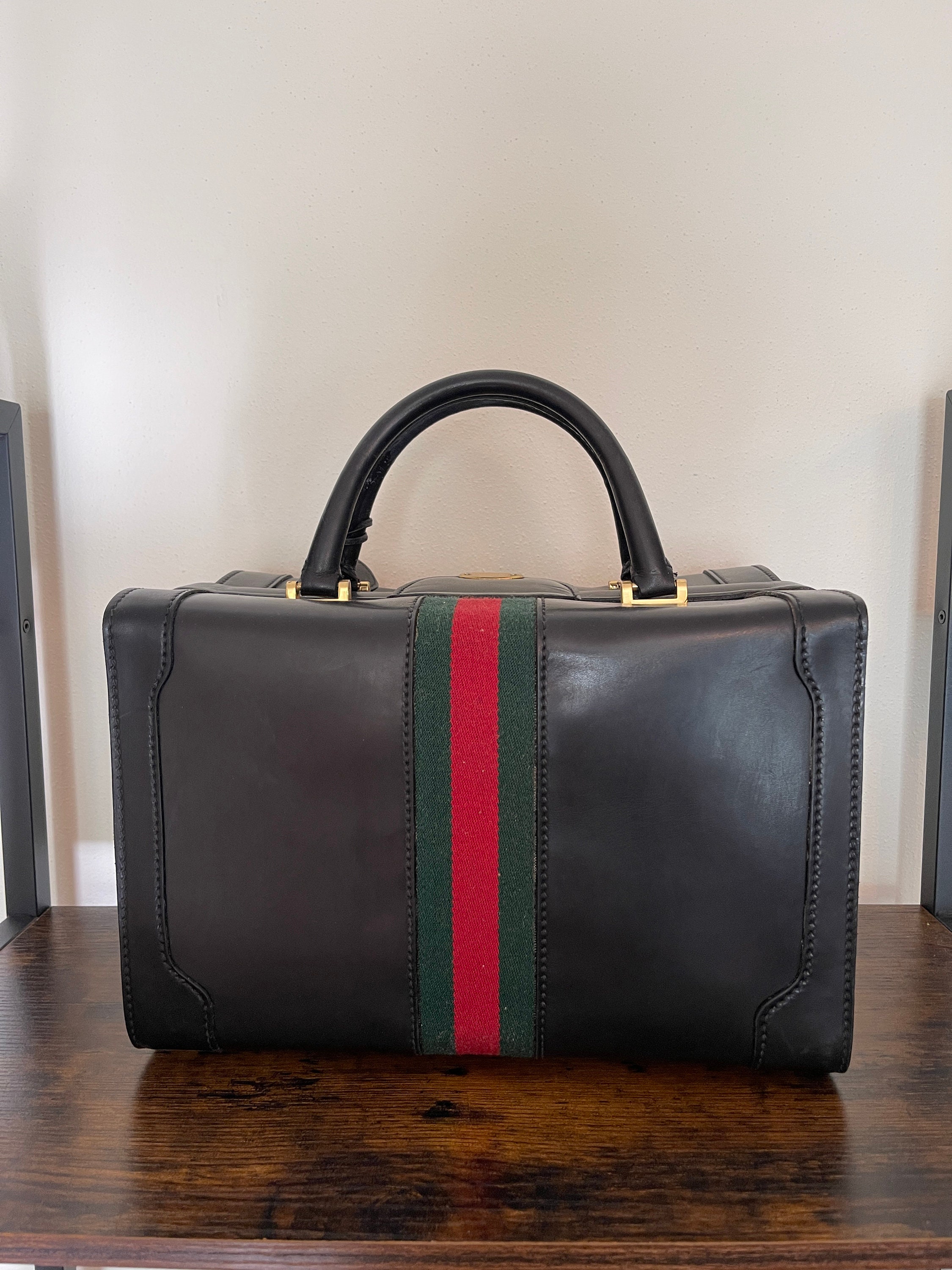 Elite Cake Designs - Novelty Birthday cake of a beautiful Gucci Mens  Briefcase with lots of dollars!