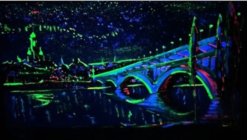May include: A painting of a city skyline at night with a bridge in the foreground. The painting is done in fluorescent colors, with the city buildings and bridge glowing in the dark. The sky is filled with stars.