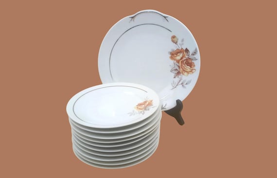 DISH and 9 vintage French porcelain dessert plates, orange-pink pattern