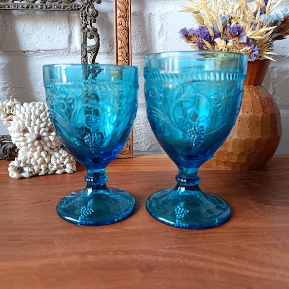 2 vintage stemmed glasses in vintage turquoise glass