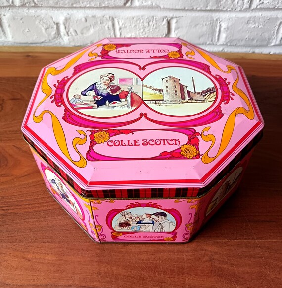 Vintage octagonal polychrome embossed metal box with lid, "scotch glue"