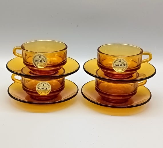 4 Duralex glass cups and saucers, amber color, France vintage
