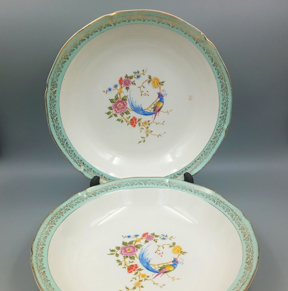 2 ROUND DEEP PLATES, Céranord Saint-Amand porcelain, Phoenix on a flowering branch