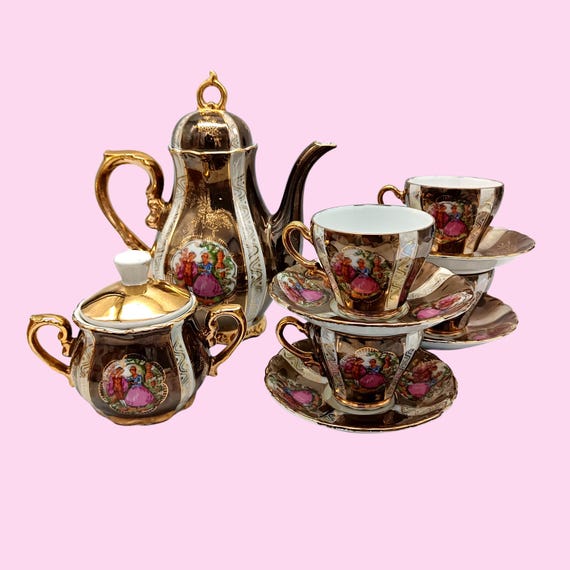 Vintage bronze-colored porcelain coffee service
