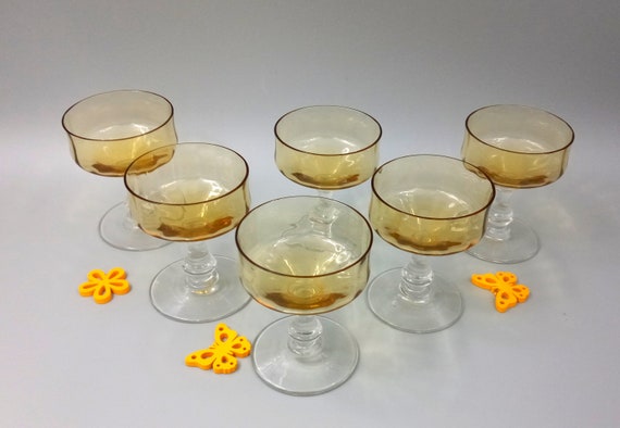 6 vintage glasses with amber yellow stems
