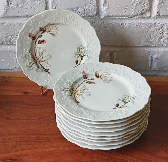 10 vintage porcelain dessert plates with embossed and floral motifs, Sologne porcelain