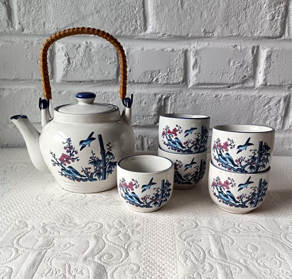 Asian tea set in ceramic and rattan