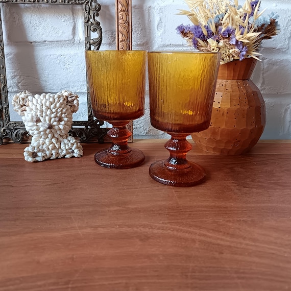 2 large vintage stemmed glasses in textured amber-colored glass
