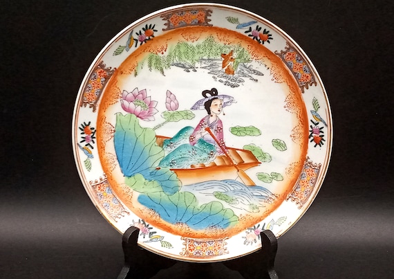 Vintage hand-painted porcelain plate from Asia