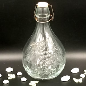 Old clamshell bottle, old glass bottle, made in Italy