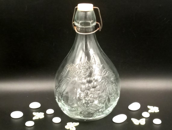 Old clamshell bottle, old glass bottle, made in Italy