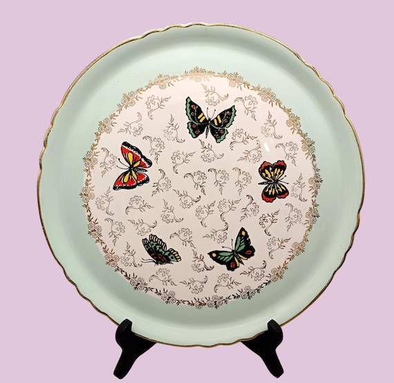 Cake dish, earthenware, green with multi-colored butterflies, vintage Orchies Moulin des loups France