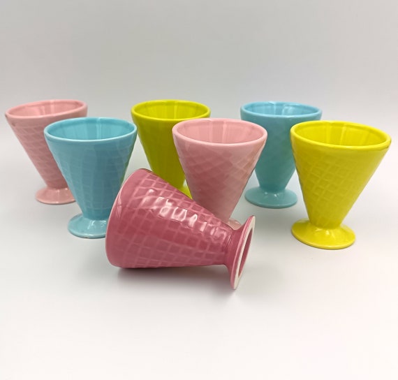 7 small CUPS in colored ceramic with embossed appearance, vintage France