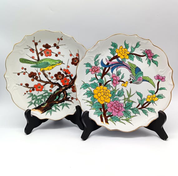 Pair of porcelain plates with vintage bird motif in Korea