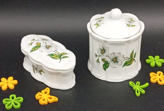 Pair of porcelain boxes with vintage white flower decor