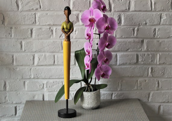 Beautiful stylized Indian statuette in a sari