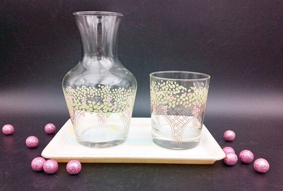 Night carafe and water glass in painted glass with a floral and butterfly motif, bedside table set