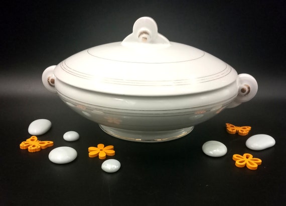 White porcelain soup tureen with gold trim