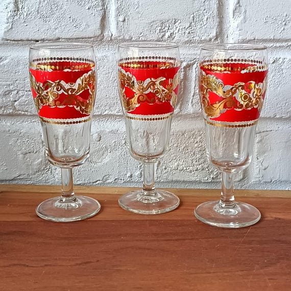 3 vintage red and gold flutes