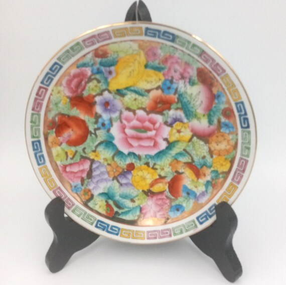Pair of decorative openwork PLATES, flower pattern