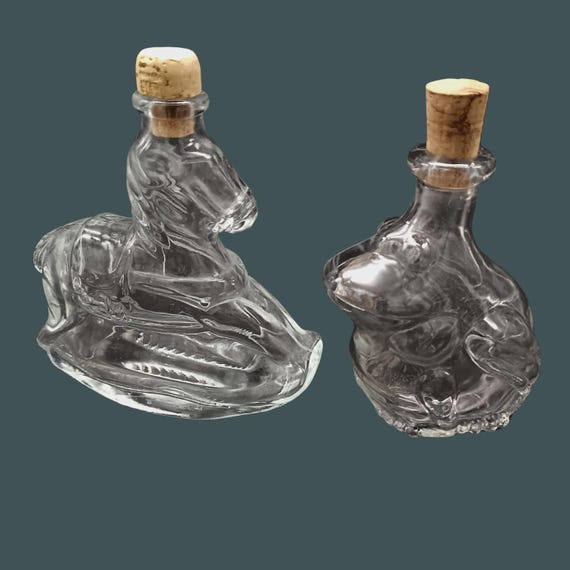 Set of 2 vintage bottles, frog, rocking horse