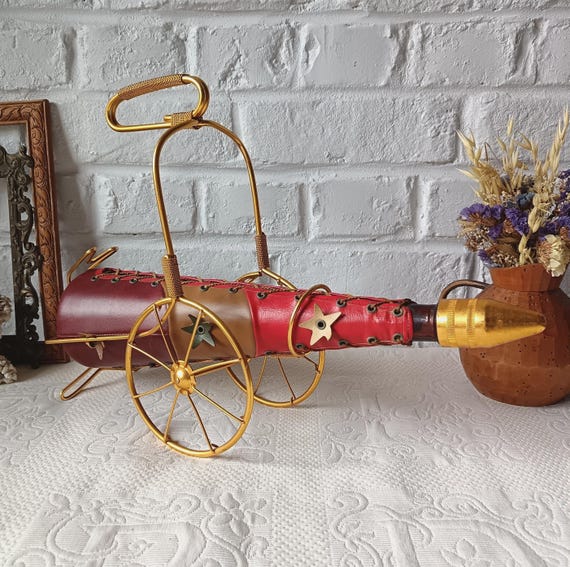 Scoubidou bottle with handle, braided with Scoubidou plastic thread. Vintage