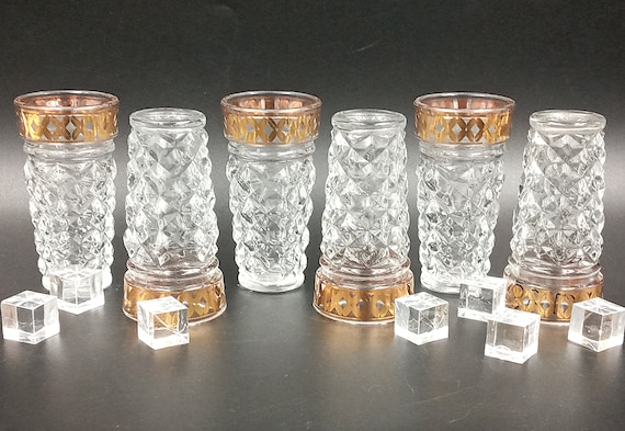 Transparent liquor glasses with vintage gold decor, vodka glass