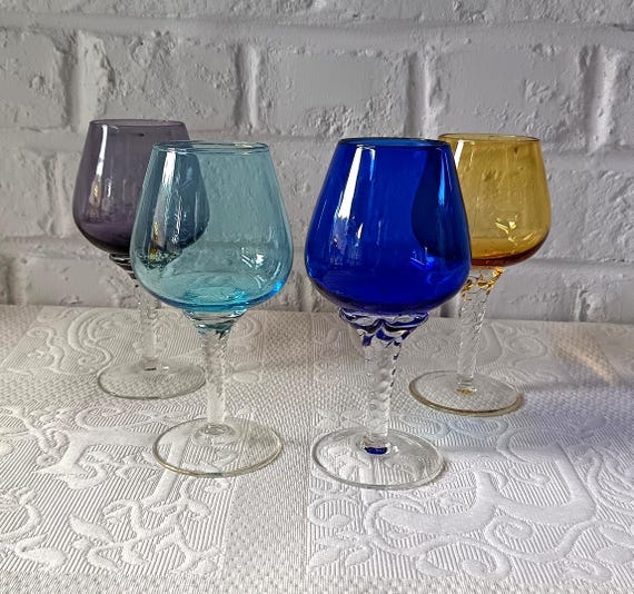 4 pretty multicolored glasses in vintage harlequin colored glass