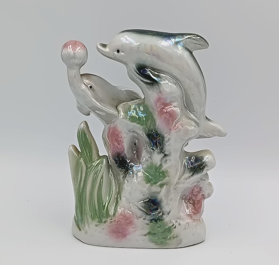 Vintage kitsch dolphin couple figurine, mother and baby