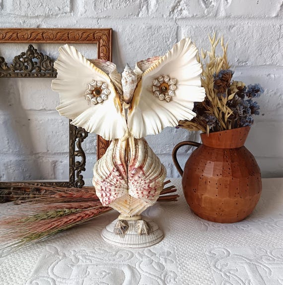 Vintage owl made of seashells, beach art, kitsch