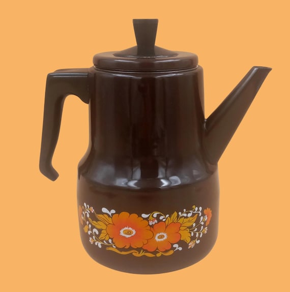 Old COFFEE MAKER in brown enameled sheet metal with orange flower pattern, Bakelite handle, vintage
