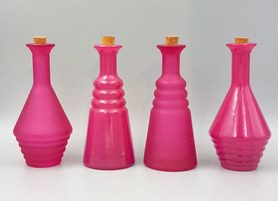 4 small fuchsia pink BOTTLES, cork stopper