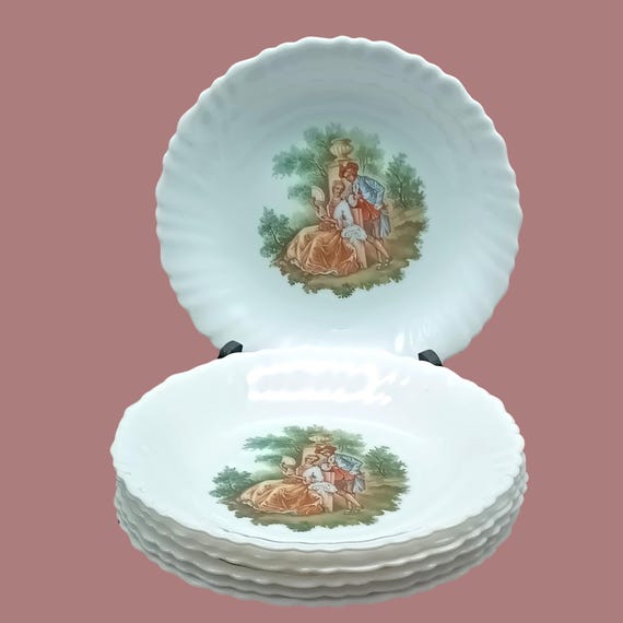 7 Arcopal France opaline soup plates, model