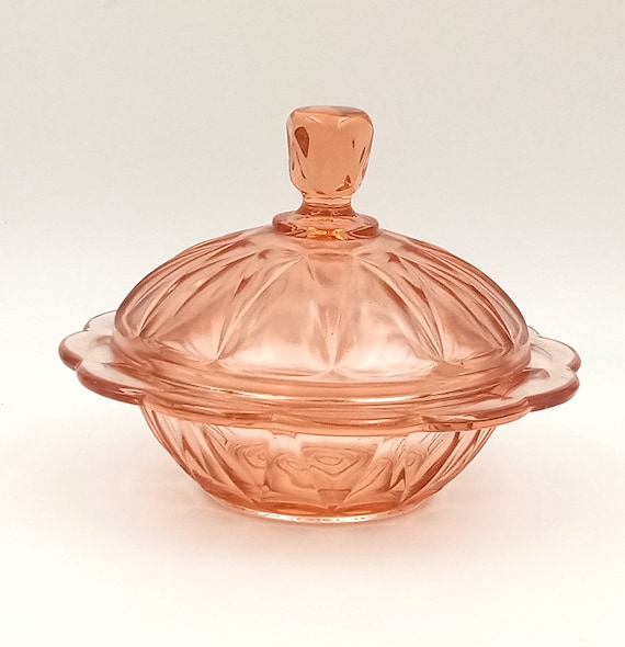 Pink colored glass candy box, sugar bowl, jewelry box