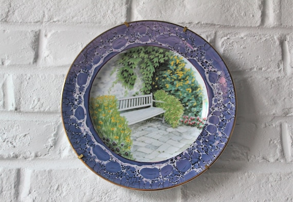 Porcelain plate with a floral garden and bench motif, vintage style