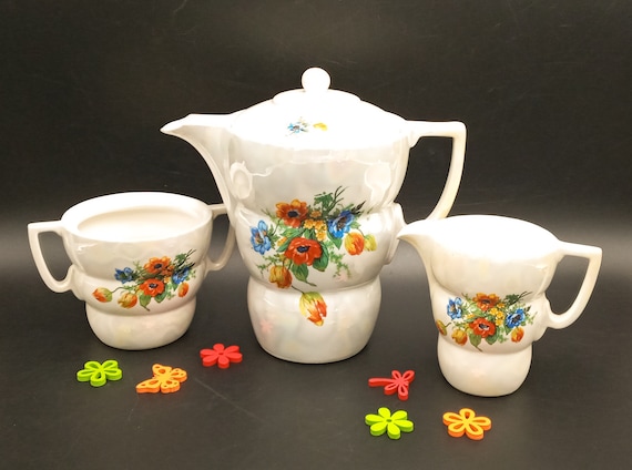 Vintage porcelain wildflower pattern coffee pot, sugar bowl and creamer Winterling Bavaria Germany