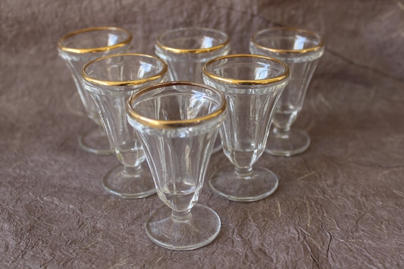 Antique liqueur glasses with stems and gold rim, early 20th century, antique French shot glasses,