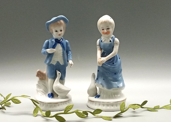 Couple of vintage ceramic FIGURINES, boy and girl, blue and white, porcelain goose