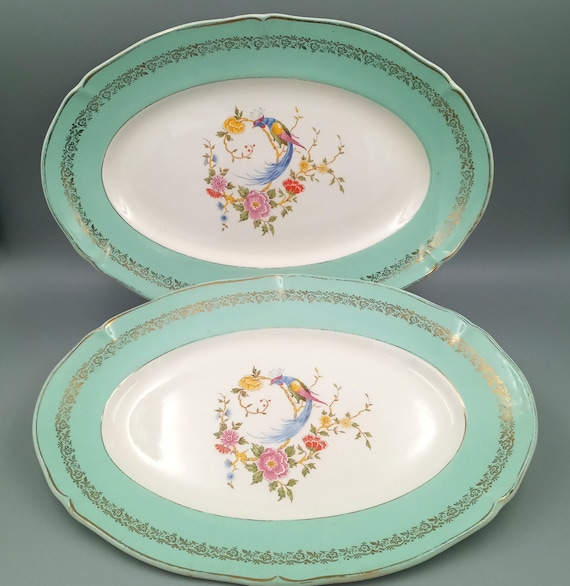 2 OVAL DISHES Céranord Saint-Amand porcelain, Phoenix on a flowering branch