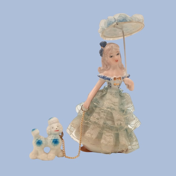 FIGURINE of woman walking her dog on a leash, Vintage Figurine Lady with poodle