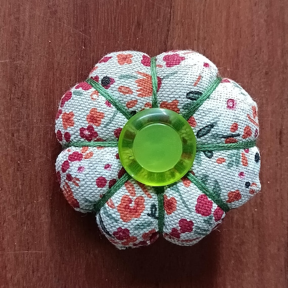 Pumpkin-shaped fabric brooch, hand-sewn