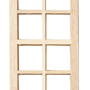 Peut inclure: Un cadre de fenêtre en bois avec neuf carreaux de verre. Le cadre est non fini et prêt à être peint ou teinté.