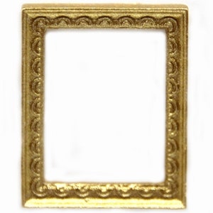 May include: A gold-colored picture frame with a decorative border. The frame is made of metal and has a rectangular shape.