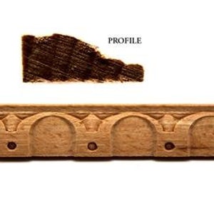 May include: Unfinished wooden molding featuring a repeating arched pattern. The molding is light brown, with a dark brown profile sample above it. The word "PROFILE" is printed in black.