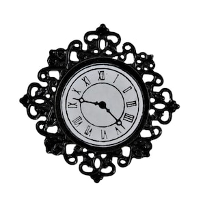May include: Black ornate clock face with Roman numerals and a white background. The clock is framed by a black metal design.