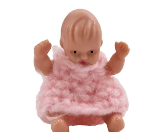 Dolls House Small Baby Doll Sitting in Pink Miniature People Nursery Accessory